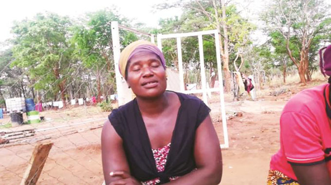 Families of miners trapped underground stay put. . . after rescue efforts are suspended