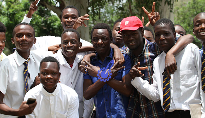 Fan-favourite-Alick-Macheso-poses-for-a-picture-with-his-young-fans-at-World-Radio-day-celebrations-at-Takashinga-Grounds-in-Highfield
