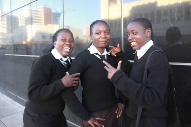 Farisai Maeresera aka Fireman (centre) with friends who double as her dancers, Valentine Mazvigadza aka Vax (right) and Nyasha Charamba