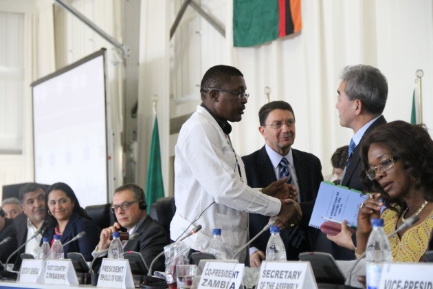 Former UNWTO President Min Hong Min hands over presidency to the incoming Co-president of the organisation Engineer Walter Mzembi while his Zambian counterpart Sylvia Masebo and Secretary General Taleb Rifai looks on 