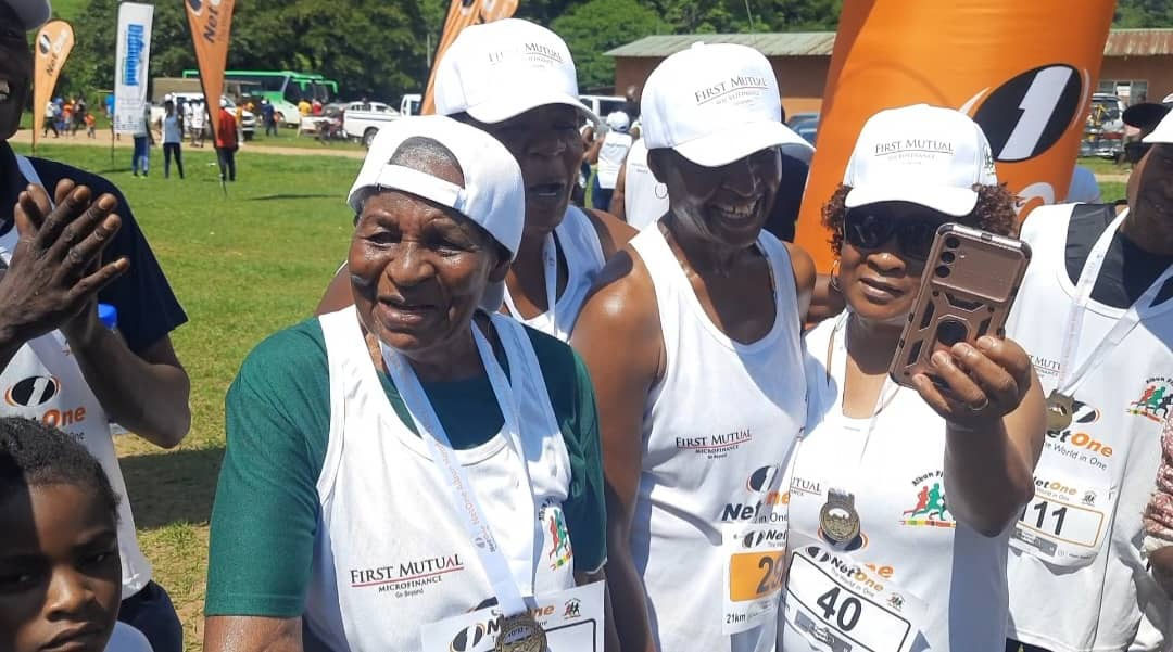 PROUD FAMILY AFFAIR . . . Gogo Zisengwe poses for a photo with her daughters after completing the race