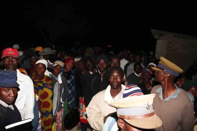 Voters impatiently wait to cast their votes at a poling station at Caledonia in Goromonzi South