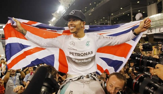 Lewis Hamilton is paraded in front of the world's media after celebrating his second world championship triumph in Abu Dhabi