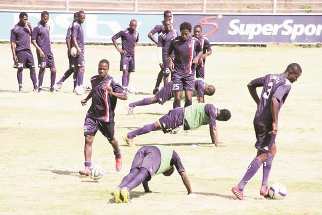 MEN AT WORK . . . Harare City players led by Ronald Chitiyo (left), Francesco Zekumbawira (middle) and Arnold Chiveya (right) go through their paces at Gwanzura yesterday as the club stepped up preparations for the CAF Confederation Cup tie against AS Adema of Madagascar