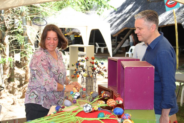 HIFA Manager Manuel Bagoro admiring the artwork of Ms Belinda Clowes yesterday