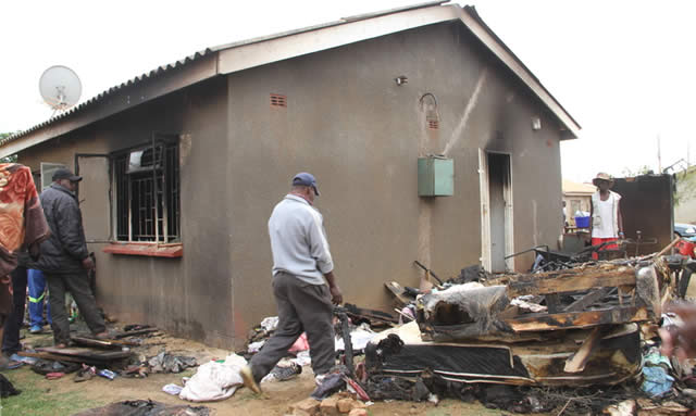 Rival gang petrol-bombs house