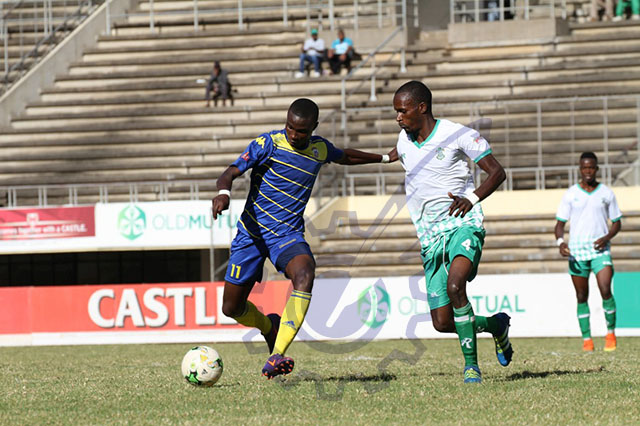 Harare City striker Wilfred Muvirimi unleashing a thunderbolt under the supervision of CAPS United defender Dennis Dauda