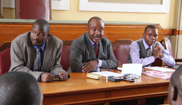 Harare Mayor  Bernard Manyenyeni flanked by his deputy Thomas Muzuva and Councilor Wellington Chikomo at Town House in Harare
