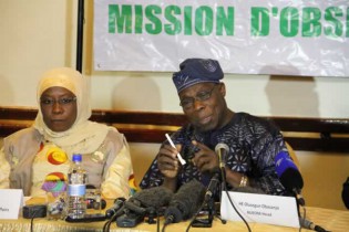 Head of AU Observer Mission General Olusegun Obasanjo addresses the media today with Dr Aisha Abdullahi AU Commissioner Political Affairs