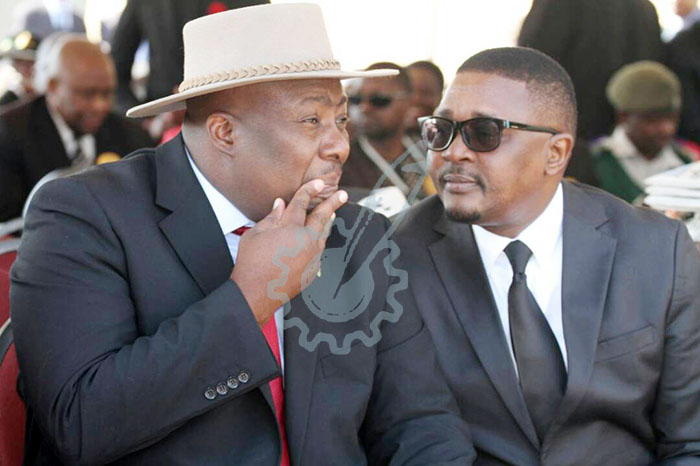 Minister Saviour Kasukuwere seated with Minister Walter Mzembi as they follow the proceedings at the National Heroes Acre