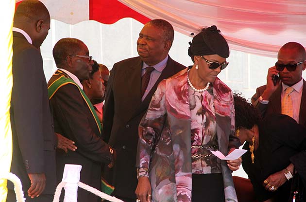 President Mugabe and First Lady Amai Dr Grace Mugabe are welcomed by Vice President Phelekezela Mphoko at the Heroes Day commemorations in Harare.-(Picture by Tawanda Mudimu)