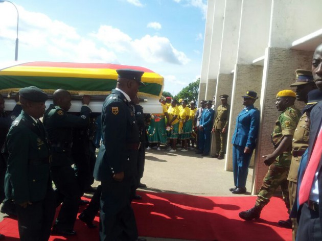 The body is carried into Stodart Hall-Pic by Elita Chikwati