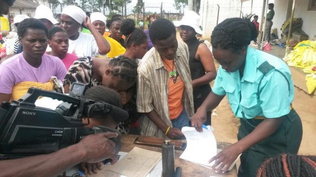 Some of the female inmates signing off to go home