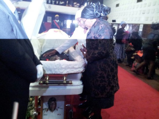 Major-General Bandama's wife Florence (in white) says goodbye.Pic by Elita Chikwati