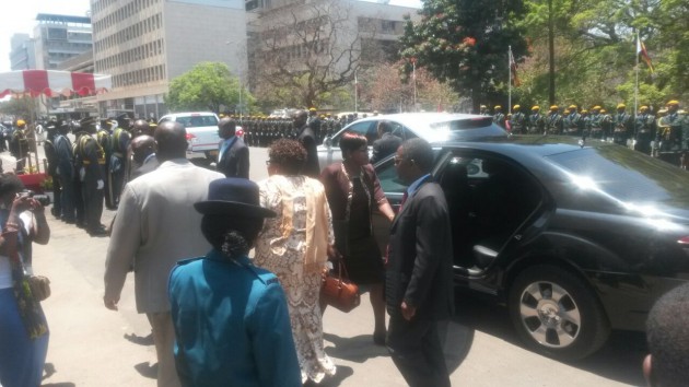 VP Mujuru (centre, with back to camera) arrives at Parliament building. (Pic by Farai Kuvirimirwa)