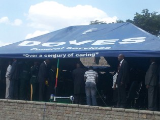 Cde Dube's coffin being lowered into the grave (pic - Lloyd Gumbo)