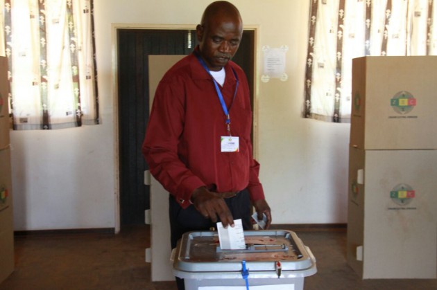 Cde Barnwell Seremwe casts his ballot at Mudzingwa Hall in Dotito.