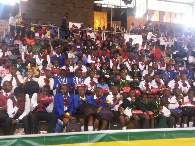 Dig in: School children tuck into their food at the city sports centre. Pic by Felex Share