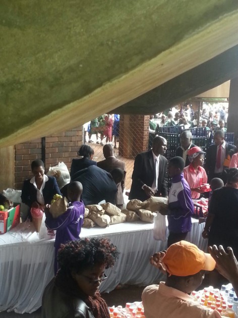 Food packs are being handed to children as they enter the venue. All pics by Felex Share