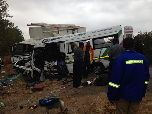 Wrecked, rescue staff at the scene of the fatal accident that accounted for 15 lives