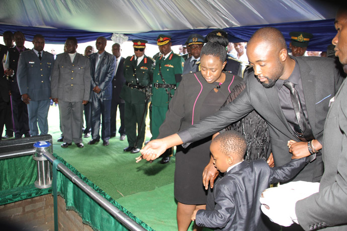 The late Brig-Gen Murozvi's family bids farewell to the gallant hero.