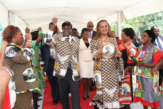President Mugabe and First Lady Amai Grace Mugabe arrive at the conference venue