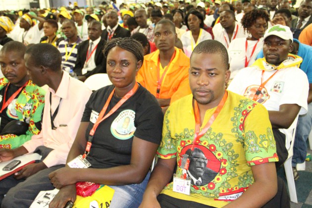 Youths pay attention to proceedings at the conference
