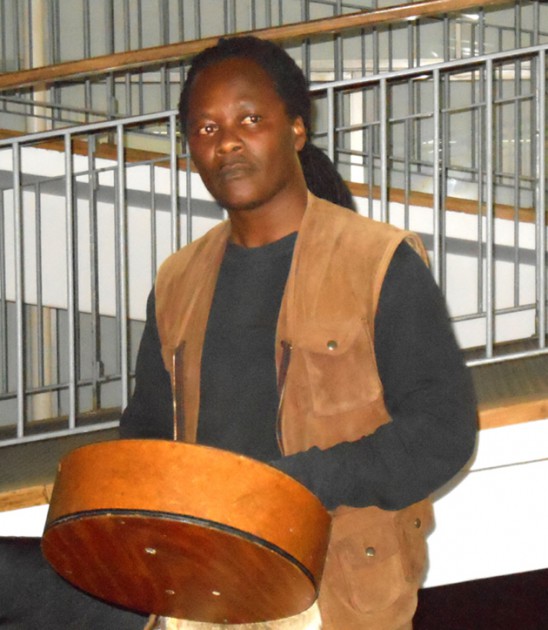 ISRAEL PLAYING MBIRA AT THE OFFICIAL OPENING OF HIS SHOW -M