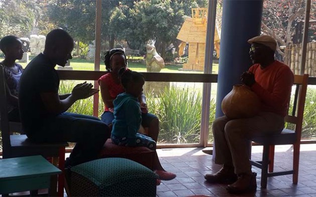 Ignatius Mabasa (right) tells stories at the launch of the Animated  Folktales project last week