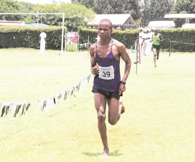 NUMERO UNO . . . Jacob Mugomeri emerged the winner in the senior men’s race at the National Cross-country championships at Morris Depot in Harare yesterday