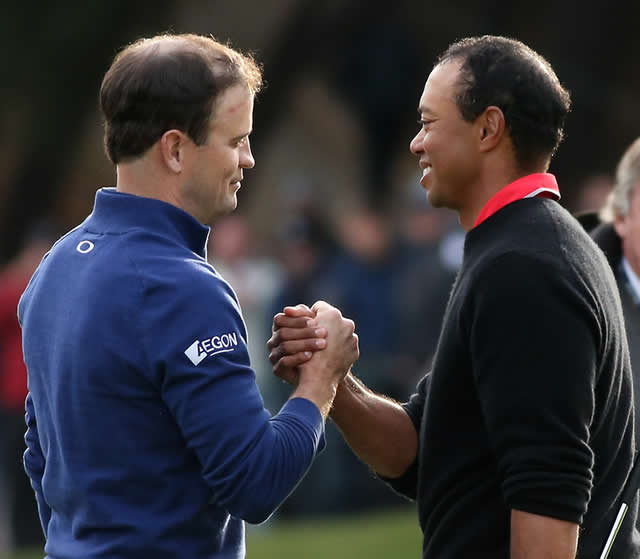 Johnson stuns Woods