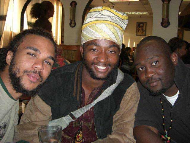 Jidenna (left) attends a masquerade ball with his best friend Black Opal Zimbabwe's Tatenda Mutseyekwa and a friend during his university days.
