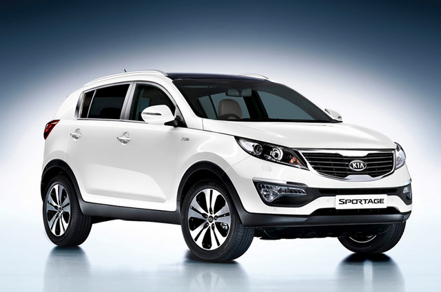 2013 Kia Sportage . . . Just as its aggressive exterior styling helps it stand out in a crowd, the handsome passenger cabin (right) gives it an edge over several better-known competitors