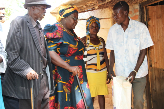 TABOO . . .Peter Chakaora (far right) and his wife Janet Chizunza show village heads Manyara.