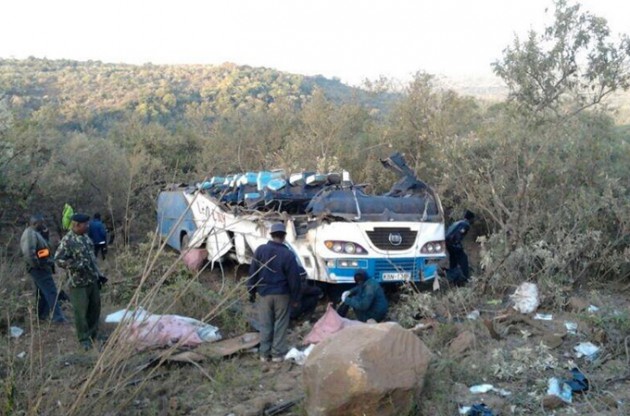 A view of the bus which crashed near the town of Narok, west of the Kenyan capital Nairobi, yesterday killing at least 41 people. The bus was travelling from Nairobi to Homa Bay on the banks of Lake Victoria when it flew off the road, rolled over and plunged down a hill. — AFP