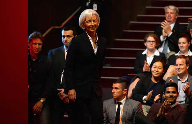 IMF chief Christine Lagarde (centre) arrives for a public question and answer session programme for ABC television in Sydney
