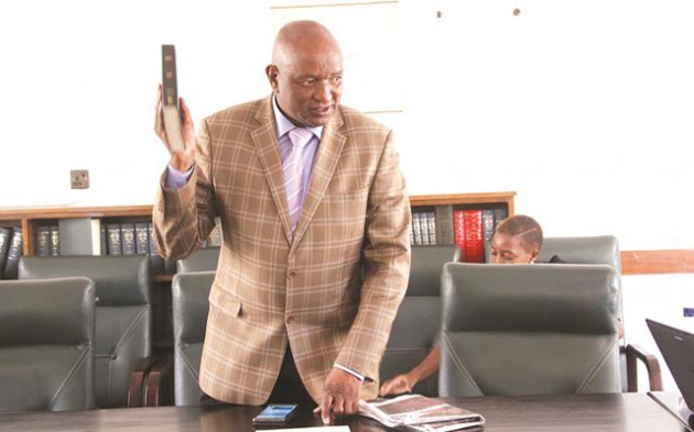 Former Mines and Energy Parliamentary Portfolio Committee chair Lovemore Matuke takes an oath as he appears before the Privileges and Immunities Committee chaired by Cde Kazembe Kazembe over the issue of Former State Procurement Board chairperson Mr Charles Kuwaza in Harare yesterday.  — (Picture by Justin Mutenda)