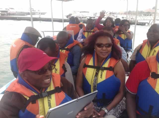 A boatload of Zimbabweans and Angolans enjoy one of the major attractions of Luanda, the ocean on the doorstep