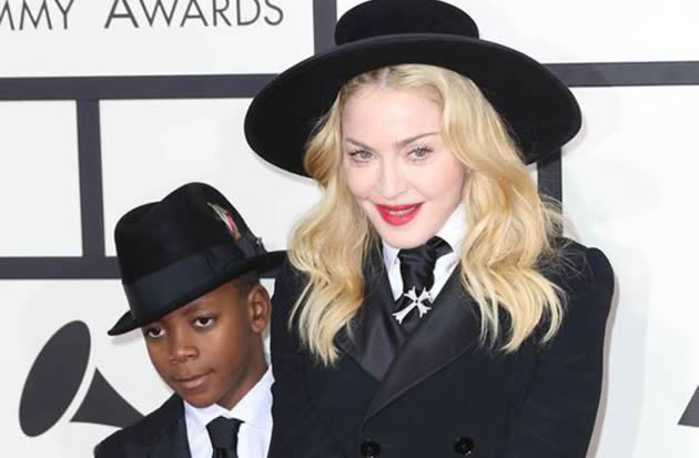 Madonna’s son gets gold grills