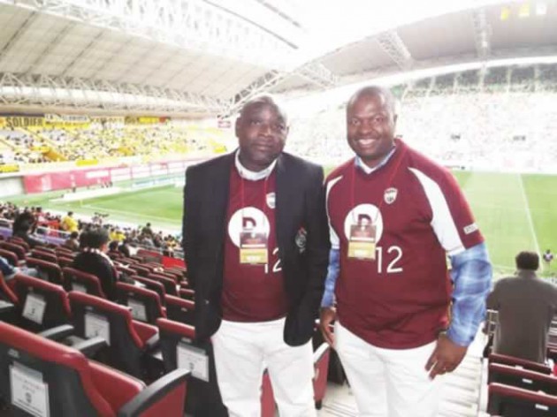 FOR THE GAME . . . Zifa Northern Region chairman Willard Manyengavana (left) and vice-chairman Martin Kweza attend a J-League match in Kobe, Japan, earlier this year where they negotiated a sponsorship package with World Navi for their Division One league programme