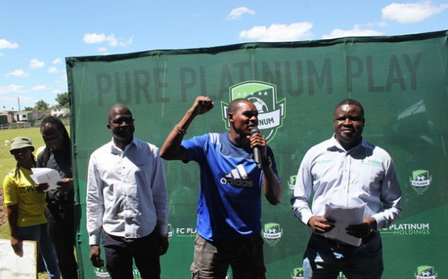 PUMPED UP FOR BATTLE . . . FC Platinum coach Norman Mapeza addresses his club’s fans and players at Mandava yesterday in the company of club president George Mawere (left) and chairman Evans Mtombeni