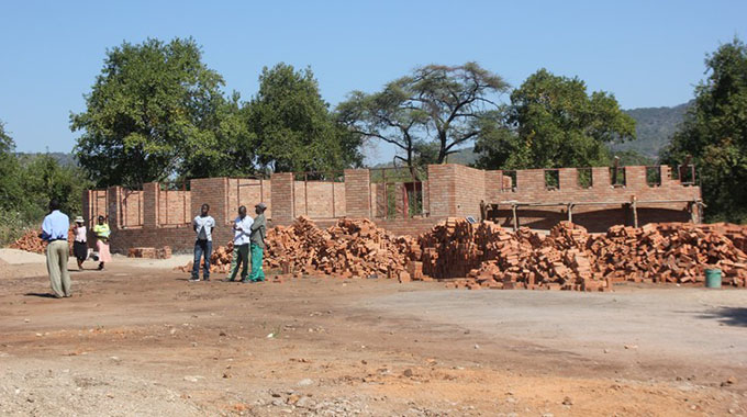 Community pools resources to  build schools