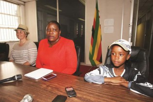 IN SUPPORT OF THE GIRL CHILD. . . Deputy Minister of Sports, Arts and Culture Tabetha Kanengoni-Malinga (centre) stresses a point while flanked by three-time World women’s motocross champion Stefy Bau of Italy (left) and young Zimbabwean female rider Tanya Muzinda during yesterday’s Press conference in Harare
