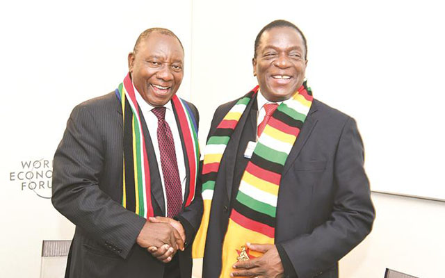 President Mnangagwa shares a lighter moment with South African Vice President and ANC leader Cde Cyril Ramaphosa on the sidelines of the 48th World Economic Forum in Davos, Switzerland, yesterday