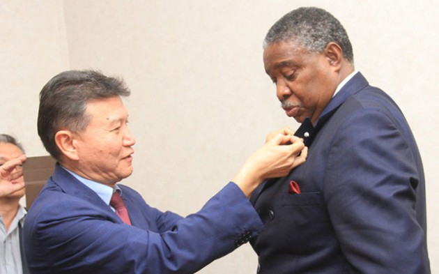 SMART PARTNERSHIPS . . . Acting President Phelekezela Mphoko is presented with a gold pin by World Chess Federation president Kirsan Illyum after the Russian paid a courtesy call yesterday ahead of the African Schools Individual Chess Championships which begin here tomorrow
