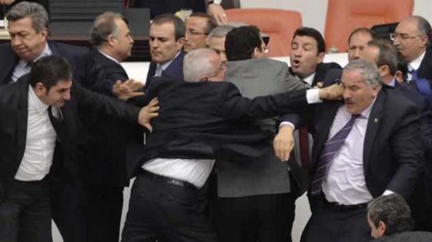 Main opposition Republican People’s Party  and ruling AK Party lawmakers scuffle during a debate on a legislation to boost police powers at the Turkish Parliament in Ankara. The legislation, which would bolster the powers of the authorities to control protests, has been widely condemned by the opposition, who accuse the AKP of trying to create a police state in the NATO member nation. — Reuters