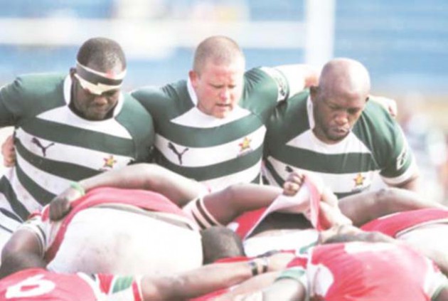 MEN ON STEEL . . . In this file photo the Sables front row of Denford Mutamangira (right), Keith Murray, Kevin Nqindi (left) scrummage against Kenya a Rugby World Cup qualifying match in Antananarivo, Madagascar. — Zimbio