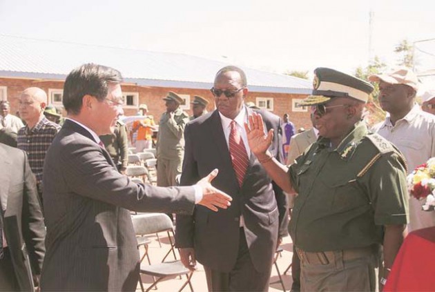 Agriculture,Mechanisation and Irrigation Development Minister Dr Joseph Made (centre), his Deputy Davies Marapira (far right) and Zimbabwe Prisons and Correctional Services (ZPCS) Commissioner-General Paradzai Zimondi are welcomed by Chinese Ambassador to Zimbabwe Mr Huang Ping at China Aid Agricultural Technology Demonstration Centre (Gwebi College) for a machinery show and field demonstration programme yesterday. — (Picture by Justin Mutenda)