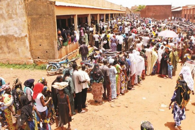 Voters queue to cast votes at a polling station in Bamako, capital of Mali, yesterday. About 7 million voters are registered to vote for the 2013 presidential election. — Xinhua.