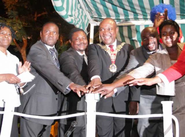 Harare Mayor Bernard Manyenyeni (centre) at a ceremony to switch on Christmas lights in December 2014. Before Independence blacks were not allowed in Africa Unity Square